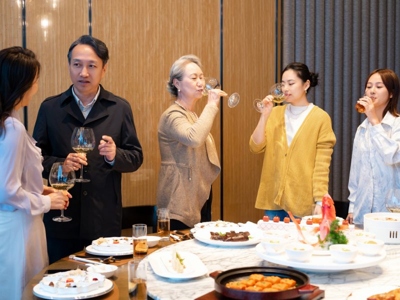 Some Asian people attending a business banquet